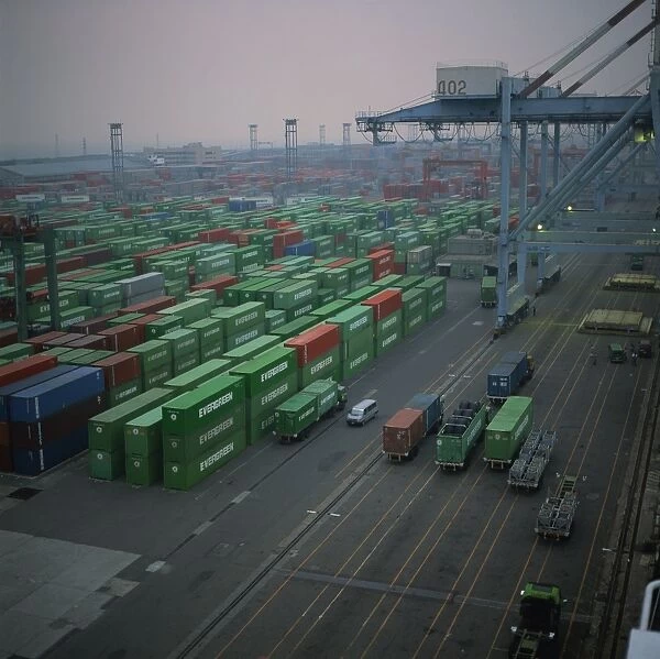 Aerial of Evergreen containers and cranes in a terminal in Taiwan
