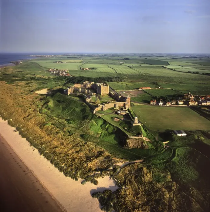 Framed Print : Aerial image of Bamburgh Castle, a Norman castle built on a basalt outcrop on the coast Framed Print : Aerial image of Bamburgh Castle, a Norman castle built on a basalt outcrop on the coast