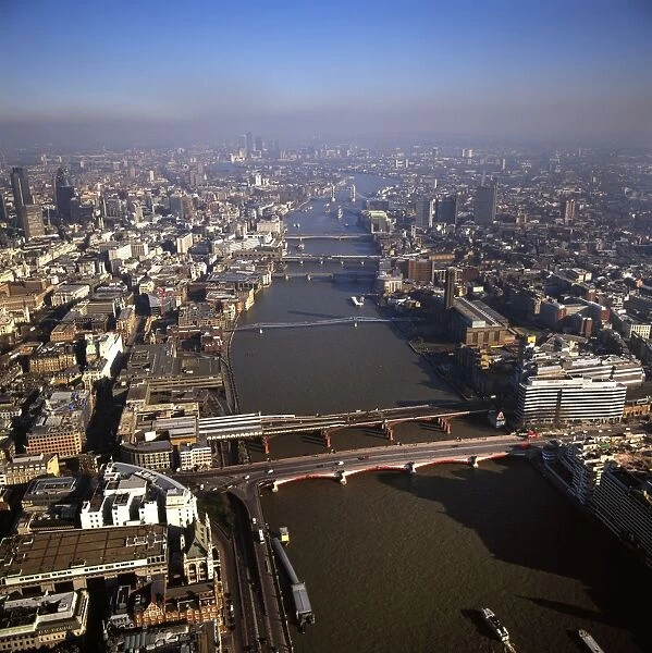Aerial image of bridges over the River Thames, looking east from Blackfriars Bridge