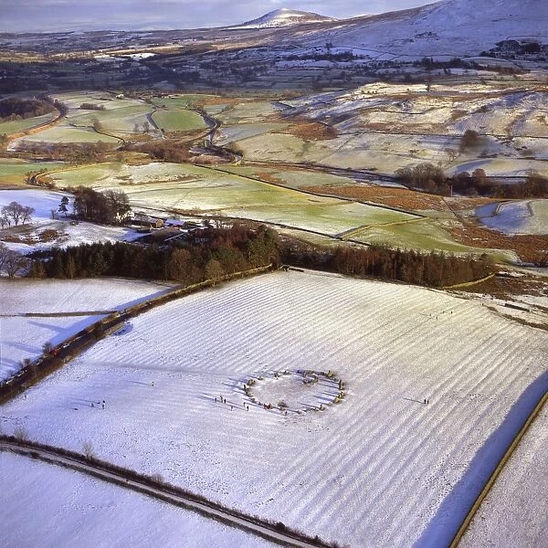 Aerial image of Castlerigg Stone Circle, a prehistoric monument in snow