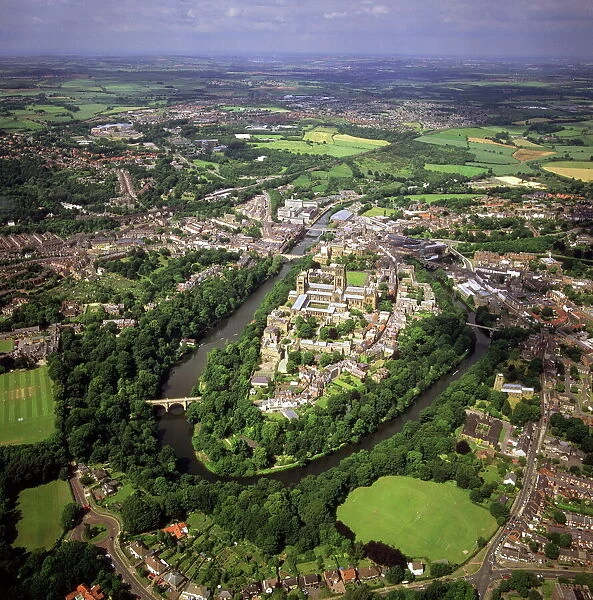 Aerial image of city including Durham Castle, a Medieval castle, Norman Cathedral