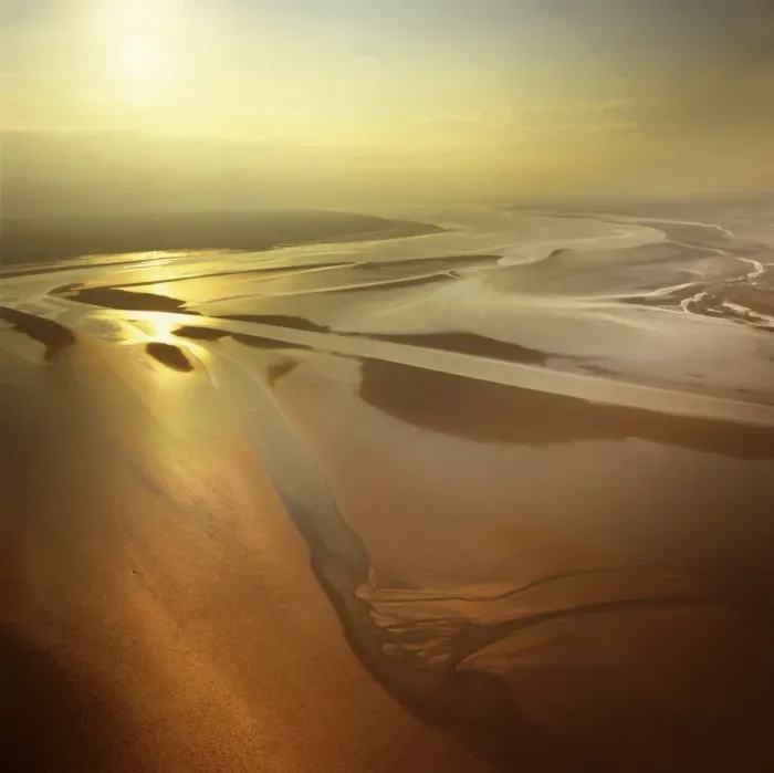 Framed Print : Aerial image of mudflats at sunset, Solway Firth, border between Cumbria in England Framed Print : Aerial image of mudflats at sunset, Solway Firth, border between Cumbria in England