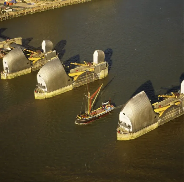 Framed Print : Aerial image of Thames sailing barge and Thames Flood Barrier across the River Thames Framed Print : Aerial image of Thames sailing barge and Thames Flood Barrier across the River Thames