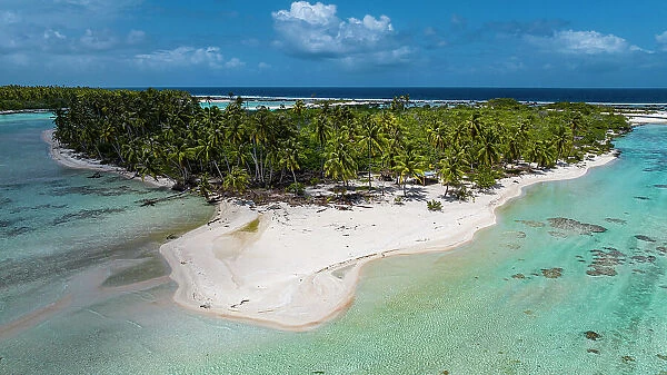 Aerial of little island with white sand beach, the Ile aux Recifs, Rangiroa atoll, Tuamotus, French Polynesia, South Pacific, Pacific
