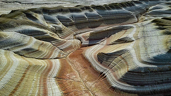 Aerial of multicoloured layers of sandstone, Kyzylkup, Mangystau, Kazakhstan, Central Asia, Asia