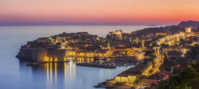 Framed Print : Aerial panorama of Dubrovnik Old Town at night with orange sunset sky, UNESCO World Heritage Site Framed Print : Aerial panorama of Dubrovnik Old Town at night with orange sunset sky, UNESCO World Heritage Site