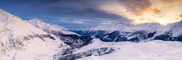 Aerial panoramic by drone of Madesimo and Andossi during a winter sunset, Valchiavenna