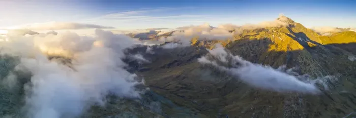 Framed Print : Aerial panoramic of sea of clouds over Pizzo Tambo and bends of the Spluga Pass road Framed Print : Aerial panoramic of sea of clouds over Pizzo Tambo and bends of the Spluga Pass road