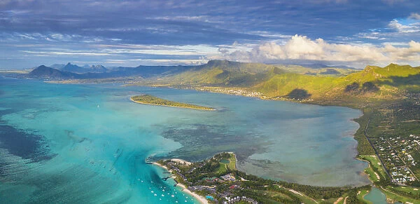Aerial panoramic of turquoise lagoon surrounding Aux Benitiers and La Gaulette, Le