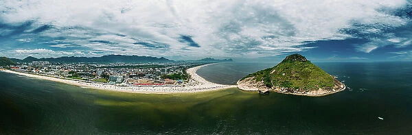 Aerial panoramic view of Pedra do Pontal, which divides Praia de Sernambetiba and Praia do Recreio, Rio de Janeiro, Brazil, South America