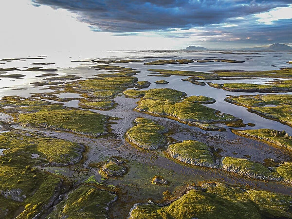 Aerial of the rugged coastline of the UNESCO World Heritage Site at sunset