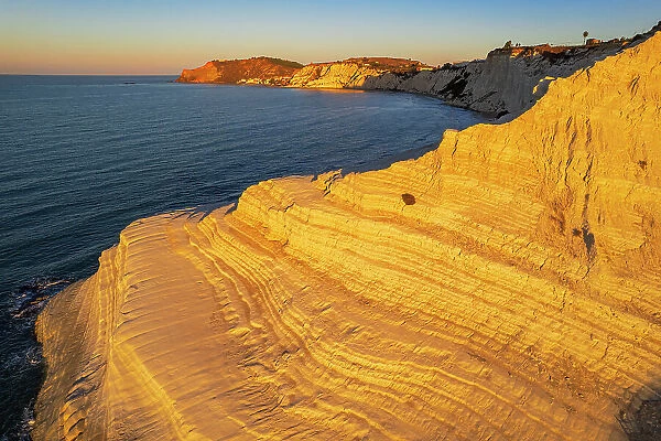 Aerial shot of Scala dei Turchi staircase seen from a drone at sunrise, Realmonte, Agrigento province, Sicily, Italy, Mediterranean, Europe