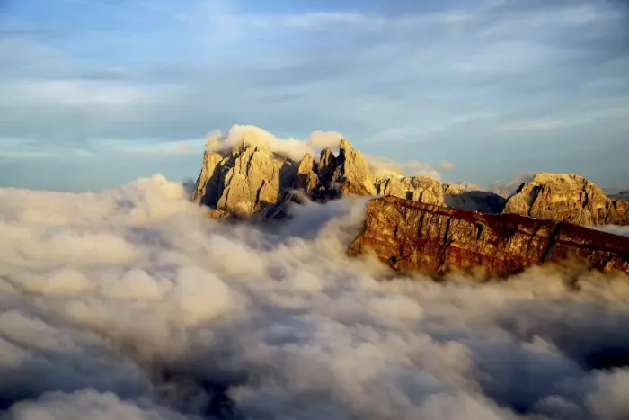 Framed Print : Aerial shot from Seceda of Odle surrounded by clouds at sunset in the Dolomites, Val Funes Framed Print : Aerial shot from Seceda of Odle surrounded by clouds at sunset in the Dolomites, Val Funes