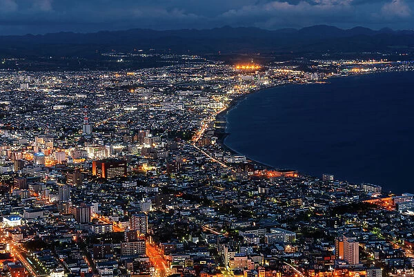 Aerial of the skyline of Hakodate at night, Hakodate, Hokkaido, Japan, Asia