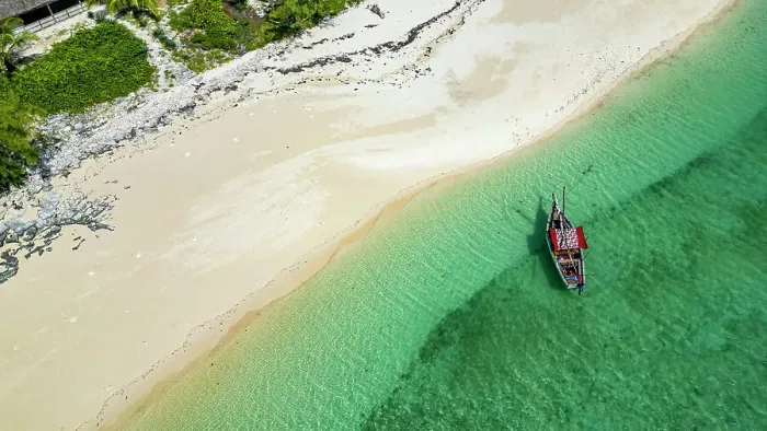 Framed Print : Aerial of a traditional Dhow on a white sand beach, Goa island near the Island of Mozambique, Mozambique, Africa Framed Print : Aerial of a traditional Dhow on a white sand beach, Goa island near the Island of Mozambique, Mozambique, Africa