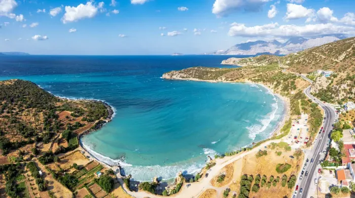 Framed Print : Aerial view of Almyros Beach washed by the turquoise sea in the gulf of Mirabella Framed Print : Aerial view of Almyros Beach washed by the turquoise sea in the gulf of Mirabella