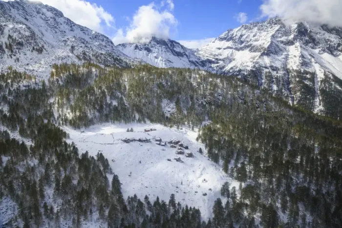Framed Print : Aerial view of the alpine village of Laguzzola framed by woods and snowy peaks, Spluga Valley Framed Print : Aerial view of the alpine village of Laguzzola framed by woods and snowy peaks, Spluga Valley