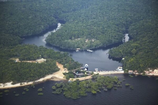 Aerial view of Amazon rainforest and beach resort along the Rio Negro, Manaus, Amazonas, Brazil, South America