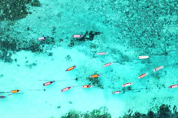 Aerial view of anchored boats in the exotic lagoon, Zanzibar, Tanzania, East Africa, Africa