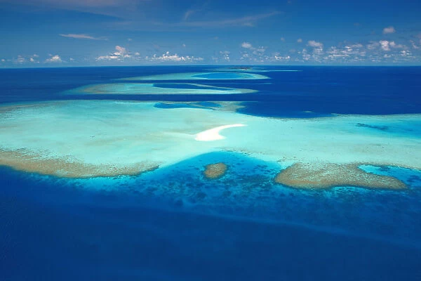 Aerial view of atolls and coral reefs, Maldives, Indian Ocean, Asia