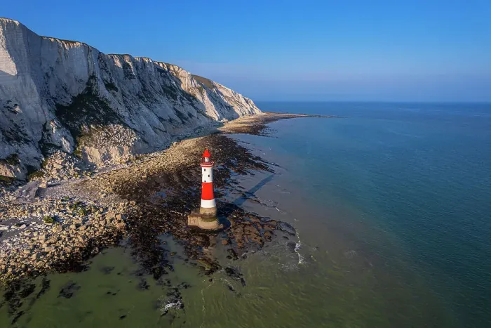 Framed Print : Aerial view of the Beachy Head Lighthouse at low tide, Seven Sisters chalk cliffs, South Downs National Park, East Sussex, England, United Kingdom Framed Print : Aerial view of the Beachy Head Lighthouse at low tide, Seven Sisters chalk cliffs, South Downs National Park, East Sussex, England, United Kingdom