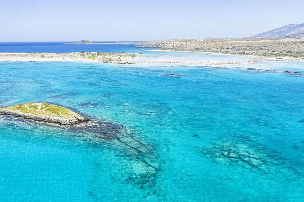 Aerial view of the blue sea surrounding Elafonisi beach, Crete island, Greek Islands, Greece, Europe
