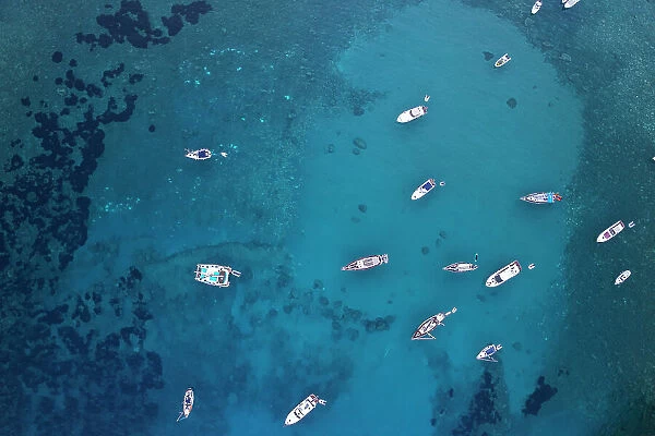 Aerial view of boats anchored in the crystal blue waters, Palmarola island, Tyrrhenian Sea, Ponza municipality, Pontine archipelago, Latina Province, Latium (Lazio), Italy, Europe