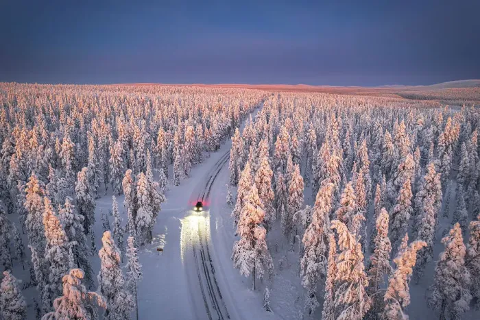 Framed Print : Aerial view of car on icy road and illuminated headlamps driving in the snowcapped forest, at dawn, Akaslompolo, Kolari, Pallas-Yllastunturi National Park, Lapland region, Finland, Europe Framed Print : Aerial view of car on icy road and illuminated headlamps driving in the snowcapped forest, at dawn, Akaslompolo, Kolari, Pallas-Yllastunturi National Park, Lapland region, Finland, Europe
