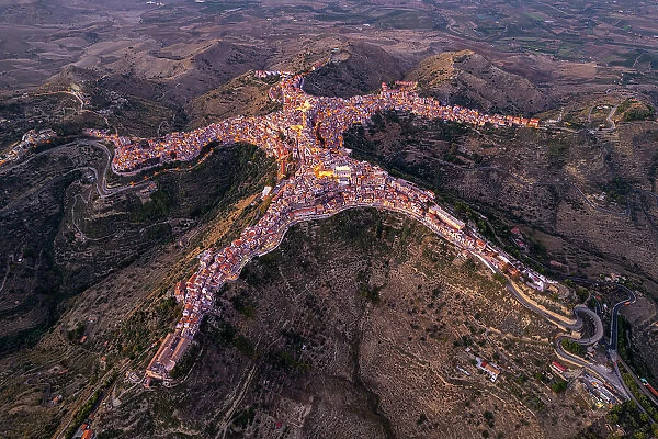 Aerial view of Centuripe, the human-shaped or star-shaped town, seen from above at dusk, Centuripe, Enna province, Sicily, Italy, Mediterranean, Europe