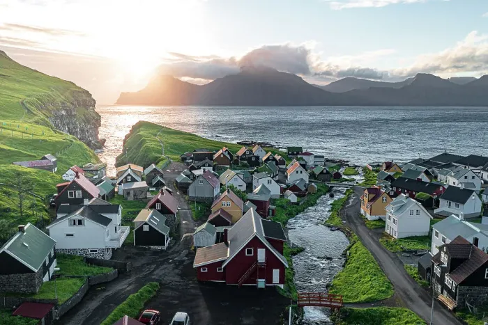 Framed Print : Aerial view of the coastal village of Gjogv and Kalsoy island at dawn, Eysturoy Island, Faroe Islands, Denmark, Europe Framed Print : Aerial view of the coastal village of Gjogv and Kalsoy island at dawn, Eysturoy Island, Faroe Islands, Denmark, Europe