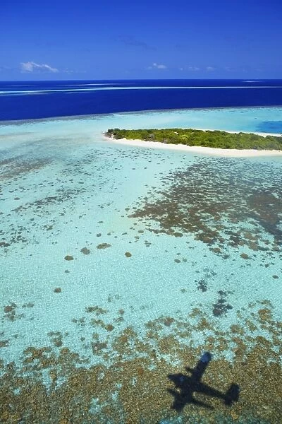 Aerial view of coral reef and deserted island, Maldives, Indian Ocean, Asia