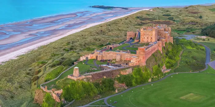 Framed Print : Aerial view by drone of Bamburgh Castle, Bamburgh, Northumberland, England, United Kingdom, Europe Framed Print : Aerial view by drone of Bamburgh Castle, Bamburgh, Northumberland, England, United Kingdom, Europe