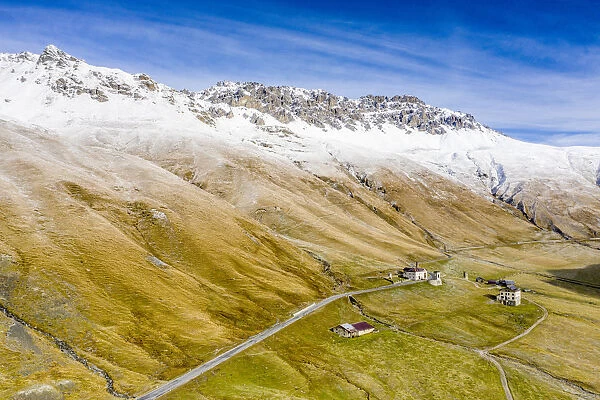 Aerial view by drone of Piz Umbrail and Punta di Rims in autumn, Braulio Valley, Bormio