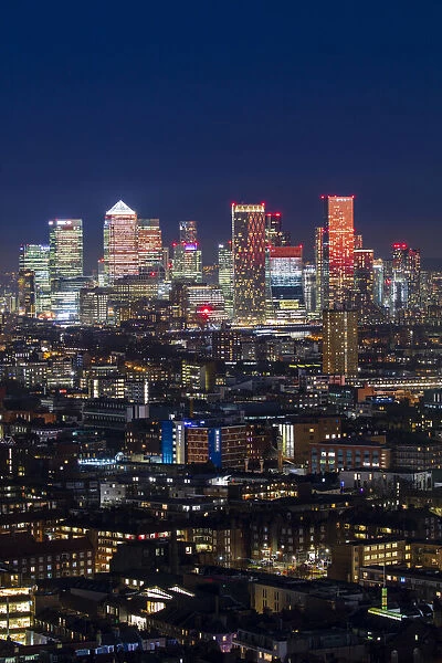 Aerial view of East London and Canary Wharf at sunset, London, England, United Kingdom, Europe