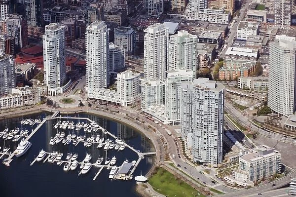 Aerial view of False Creek harbour and downtown buildings, Vancouver, British Columbia