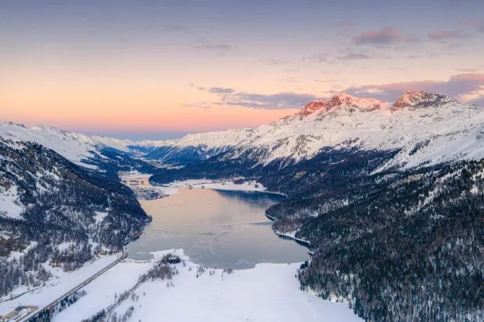 Framed Print : Aerial view of frozen Lake Silvaplana and Piz Corvatsch covered with snow at sunset Framed Print : Aerial view of frozen Lake Silvaplana and Piz Corvatsch covered with snow at sunset
