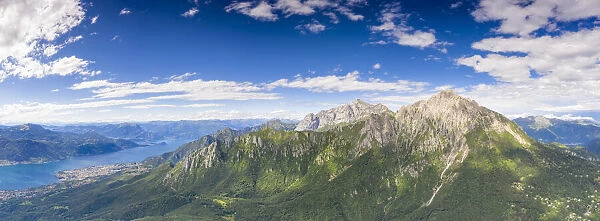 Aerial view of Grigne mountains with Abbadia Lariana and Mandello Del Lario in the