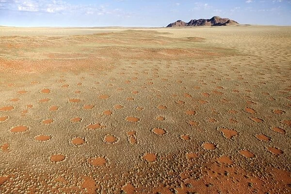 Aerial view from hot air balloon over magnificent desert landscape covered in Fairy Circles, Namib Rand game reserve Namib Naukluft Park, Namibia, Africa