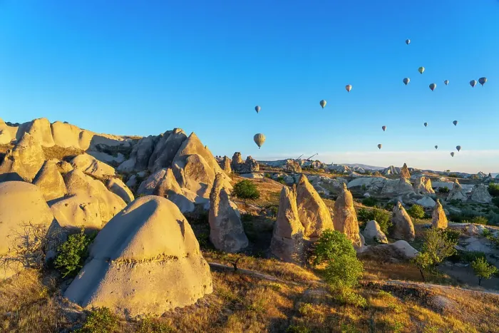 Framed Print : Aerial view of hot air balloons over rock formations at sunrise, Goreme, Goreme Historical National Park, UNESCO World Heritage Site, Cappadocia, Central Anatolia Region, Anatolia, Turkey, Asia Minor, Asia Framed Print : Aerial view of hot air balloons over rock formations at sunrise, Goreme, Goreme Historical National Park, UNESCO World Heritage Site, Cappadocia, Central Anatolia Region, Anatolia, Turkey, Asia Minor, Asia