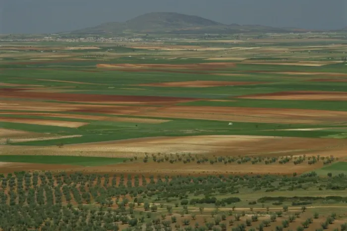Framed Print : Aerial view of landscape of fields around the town Framed Print : Aerial view of landscape of fields around the town