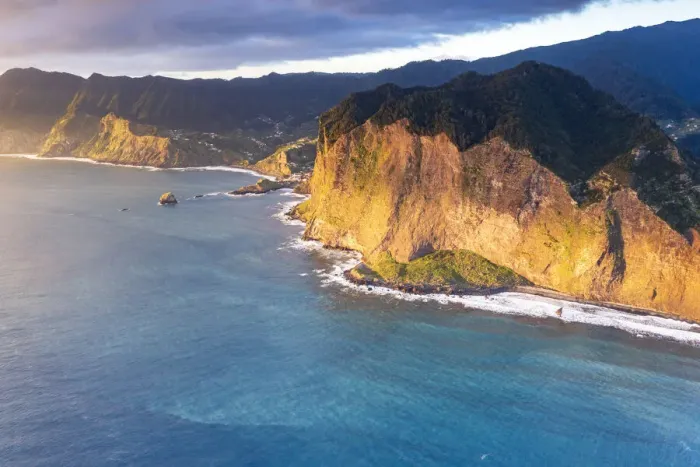 Framed Print : Aerial view of majestic cliffs and coastline at sunrise from Guindaste viewpoint, Faial Framed Print : Aerial view of majestic cliffs and coastline at sunrise from Guindaste viewpoint, Faial