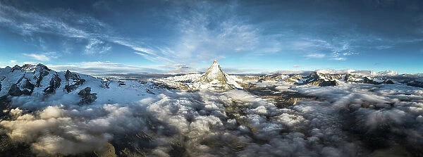 Aerial view of Matterhorn mountain peak in a sea of clouds at dawn, Zermatt, canton of Valais, Switzerland, Europe