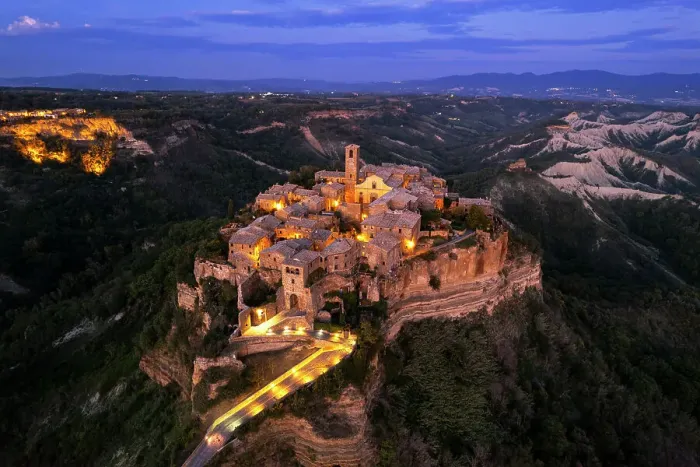 Framed Print : Aerial view of the medieval village of Civita di Bagnoregio lit at dusk, Viterbo province, Latium (Lazio), Italy, Europe Framed Print : Aerial view of the medieval village of Civita di Bagnoregio lit at dusk, Viterbo province, Latium (Lazio), Italy, Europe