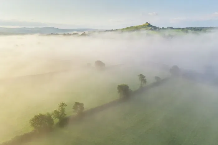 Framed Print : Aerial view over mist shrouded countryside towards Brentor Church, Dartmoor National Park, Devon, England, United Kingdom, Europe Framed Print : Aerial view over mist shrouded countryside towards Brentor Church, Dartmoor National Park, Devon, England, United Kingdom, Europe