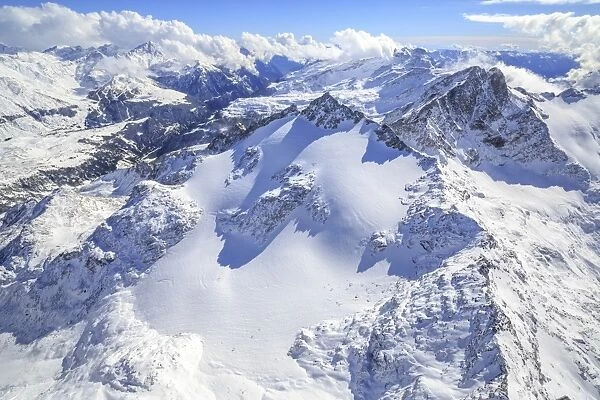 Aerial view of Peak Ferra covered with snow, Spluga Valley, Chiavenna, Valtellina