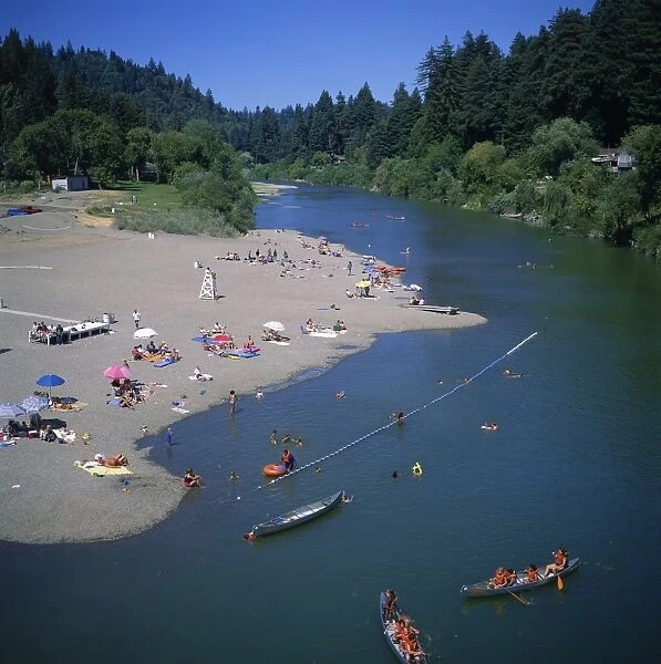 Aerial view over people boating and paddling in the