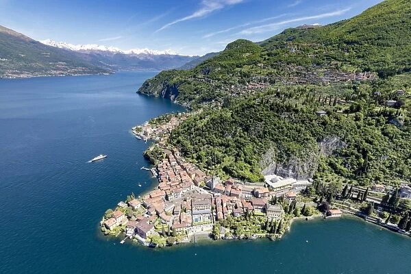Aerial view of the picturesque village of Varenna surrounded by Lake Como and gardens