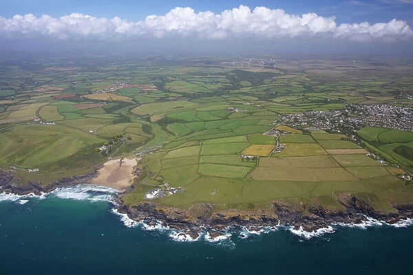 Aerial view of Poldhu Cove and Mullion, looking east to Goonhilly, Lizard Peninsula
