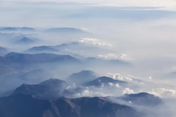 Framed Print : Aerial view of the profile of the mountain peaks surrounded by mist, Orobie Alps Framed Print : Aerial view of the profile of the mountain peaks surrounded by mist, Orobie Alps