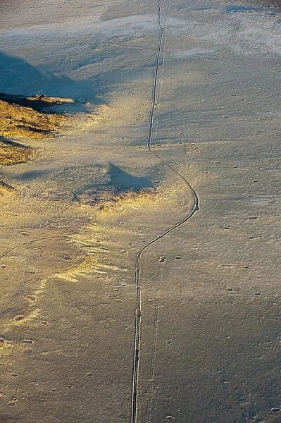 Aerial view of road in the desert and fairy circles, Namib Naukluft Park, Namib Desert, Namibia, Africa